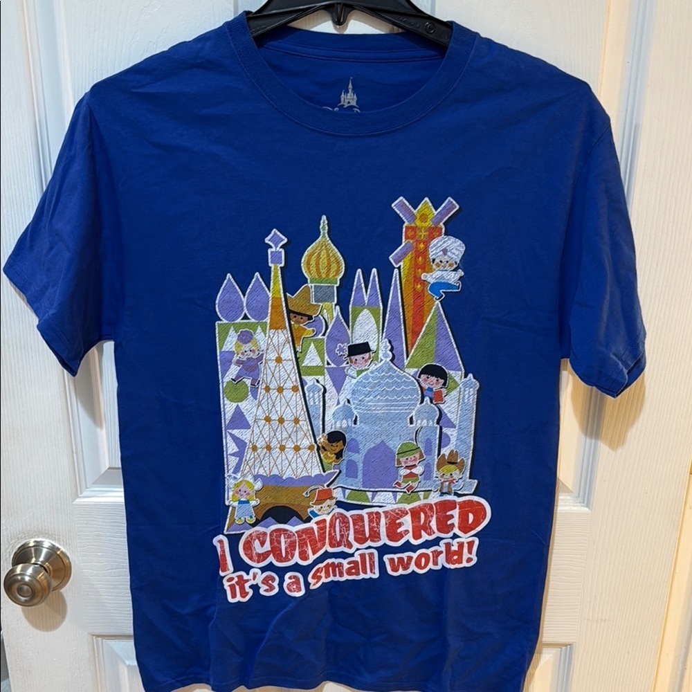 Disney World Parks It’s A Small World Tee in excellent condition looks new